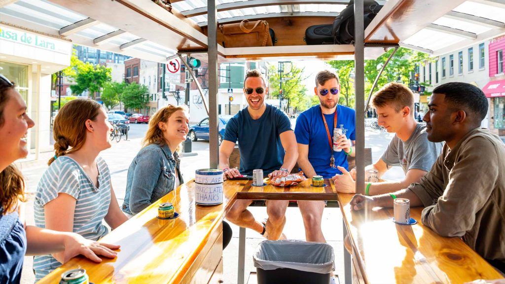Group celebrating on Trolley Pub
