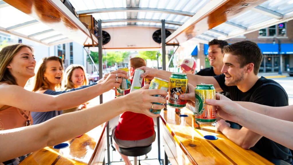 Guests cheering on Trolley Pub